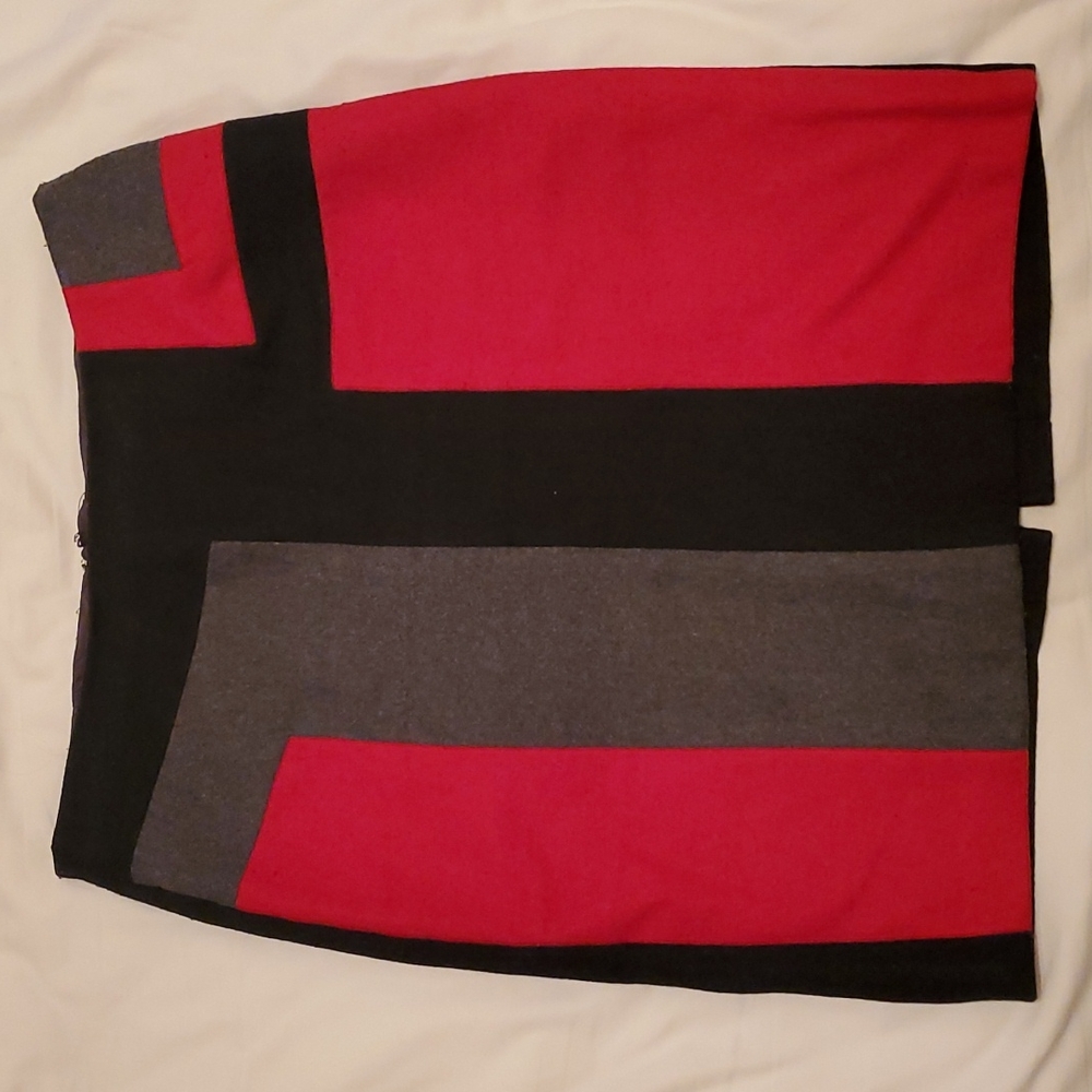 Abstract patterned red skirt. Size medium